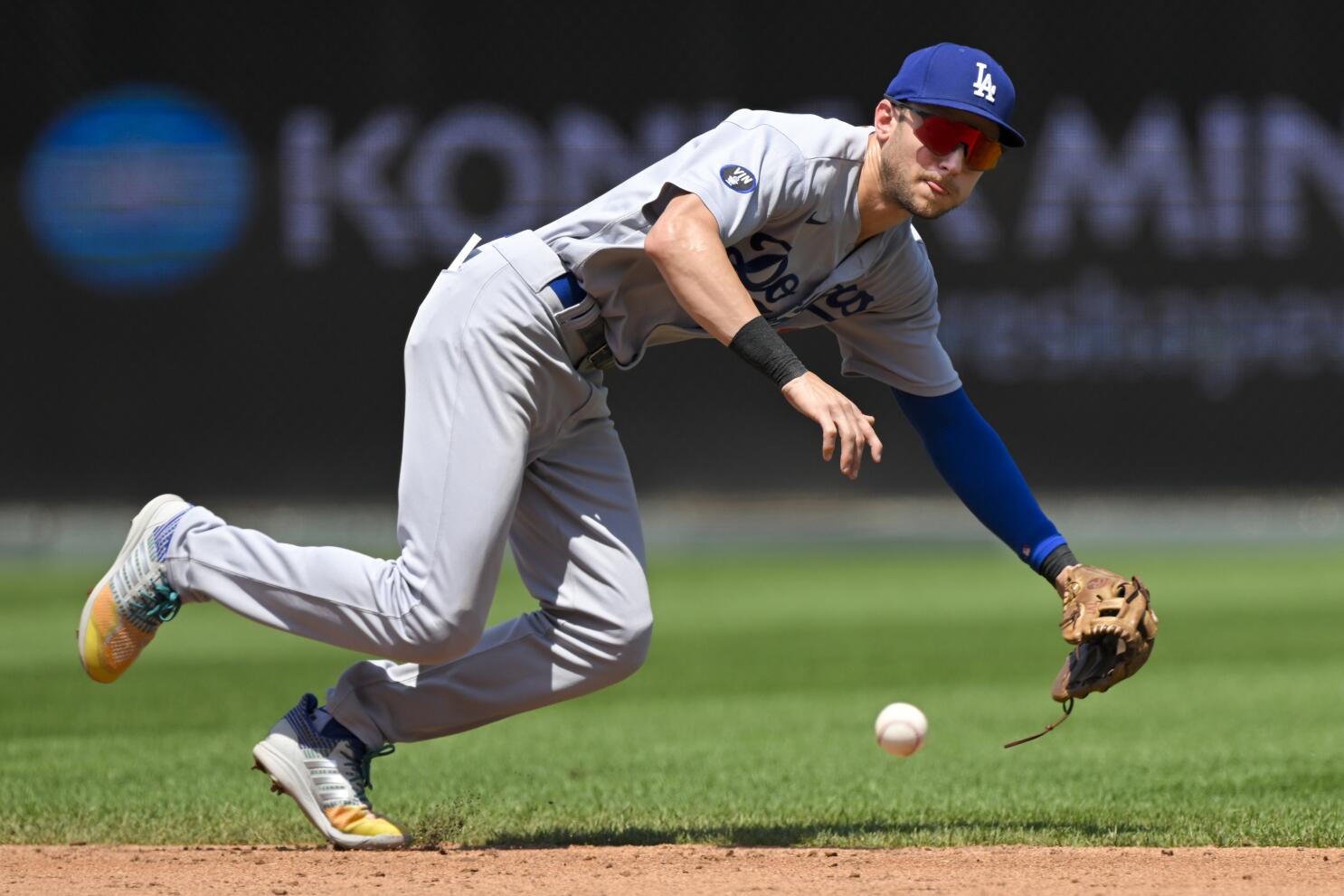 Dodgers' 12-game win streak ends; Singer, Royals blank LA