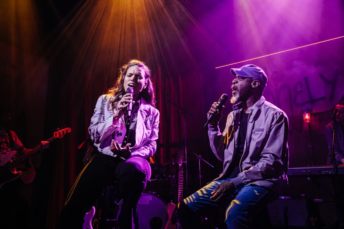 Ciara Renée and Thomas Silcott singing in "The Lonely Few" at Geffen Playhouse.