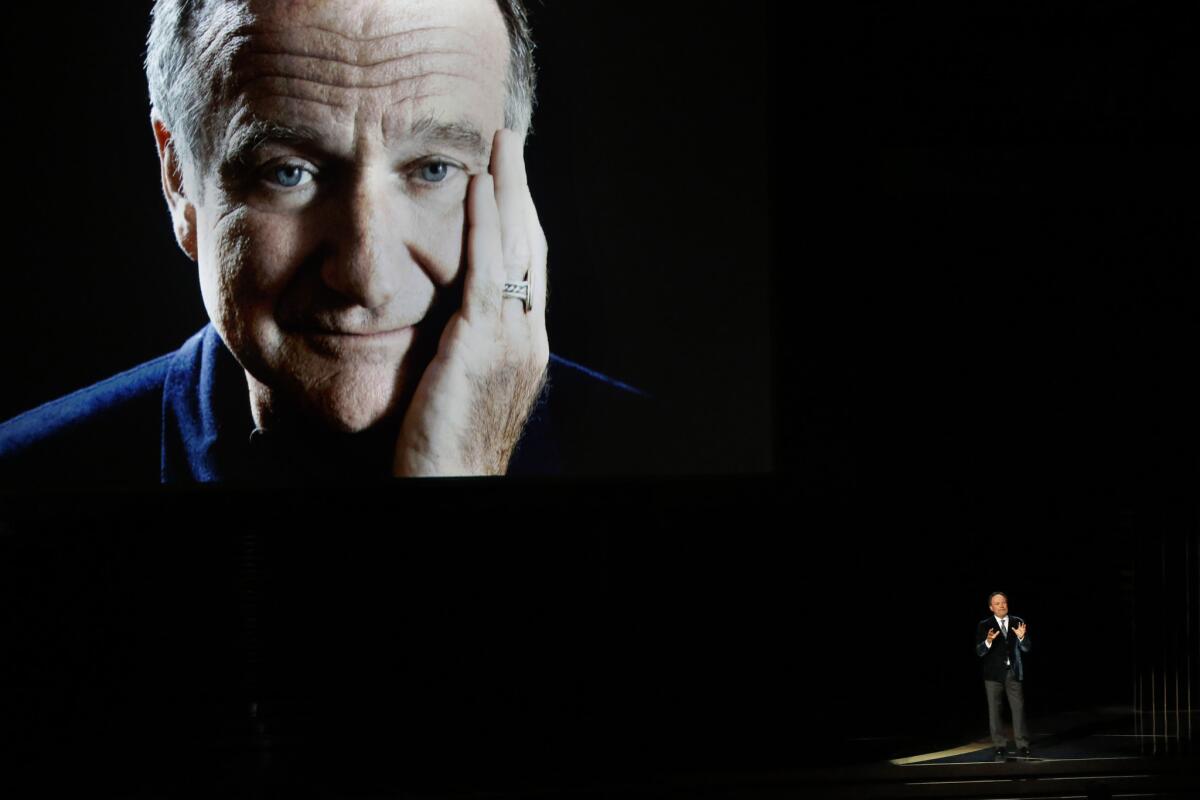 Billy Crystal pays tribute to the late Robin Williams during the 66th Primetime Emmy Awards at Nokia Theatre L.A. LIVE.