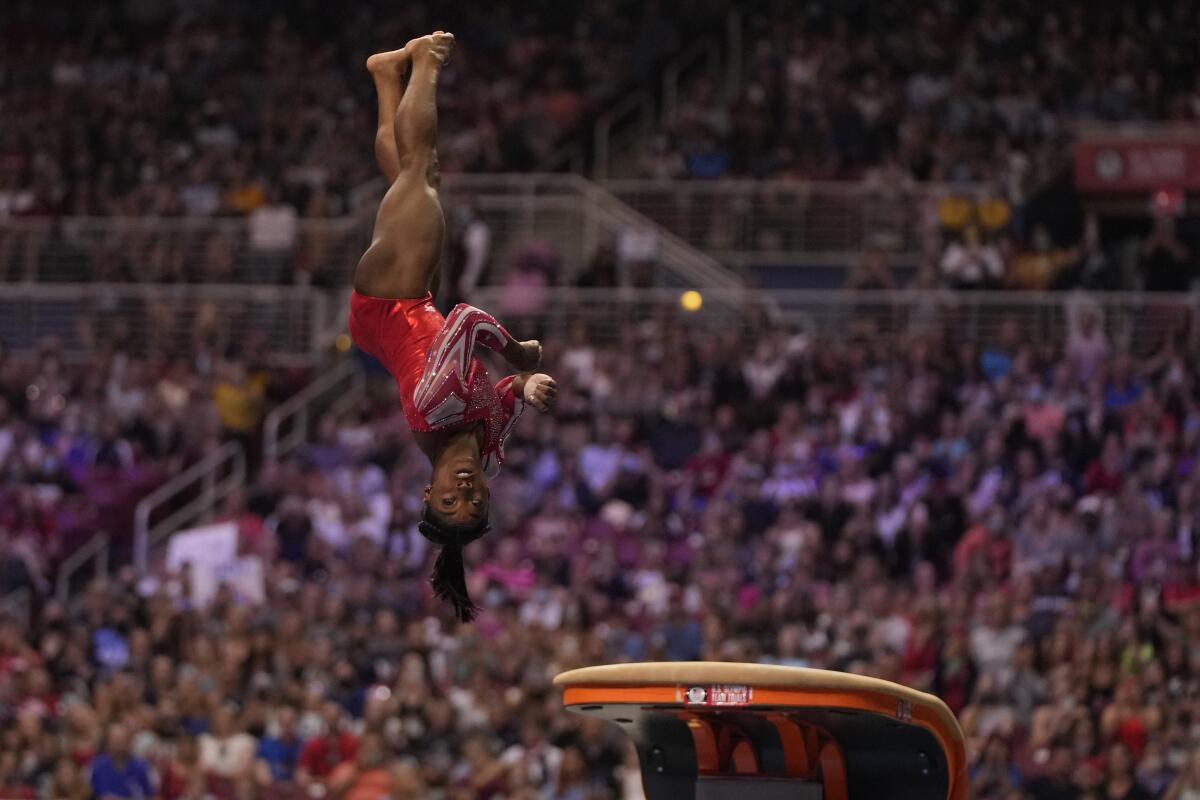Simone Biles competes on the vault during the women's U.S. Olympic gymnastic trials in June.