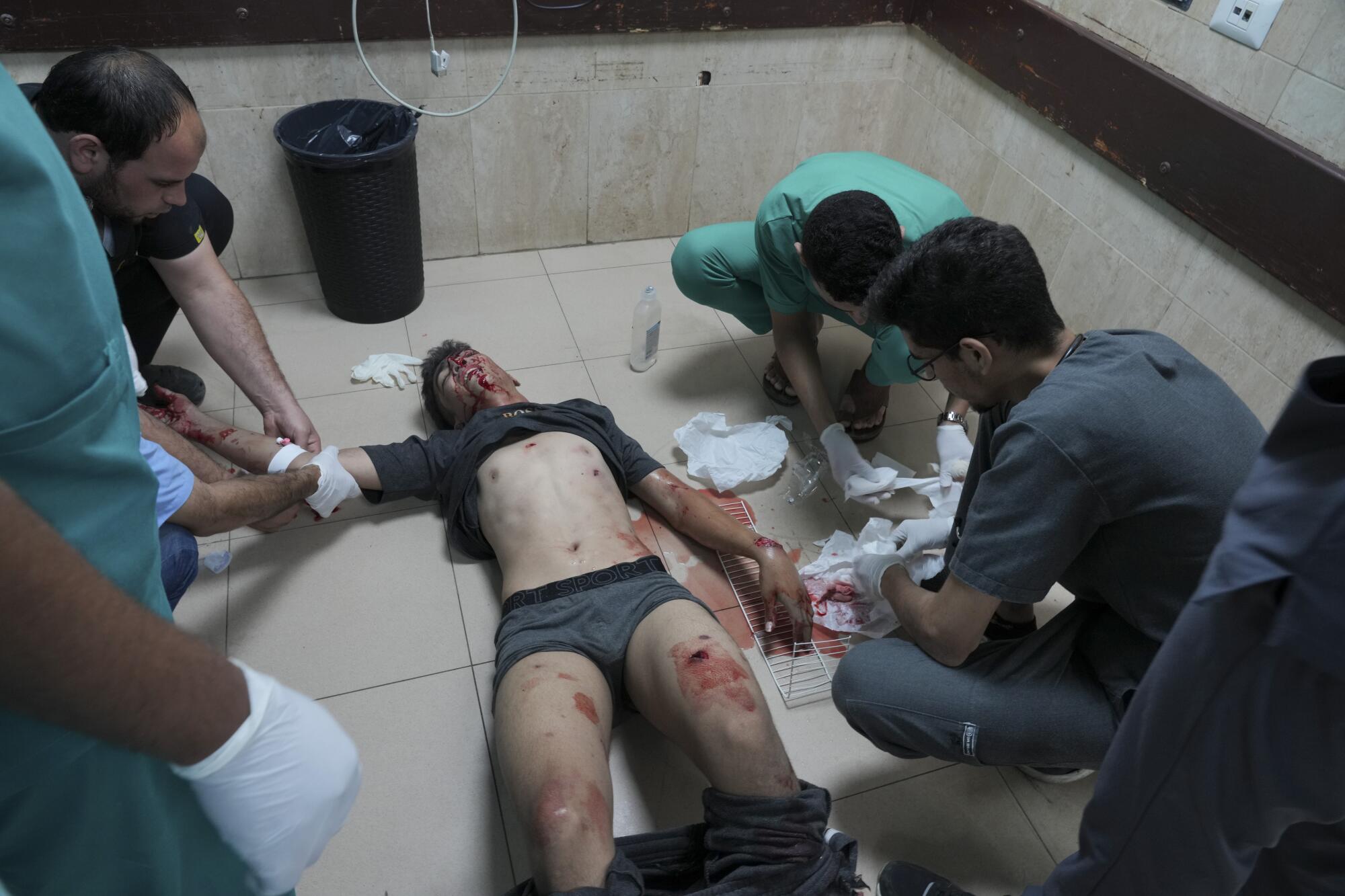 Palestinian wounded in Israeli bombardment being treated in a Gaza hospital