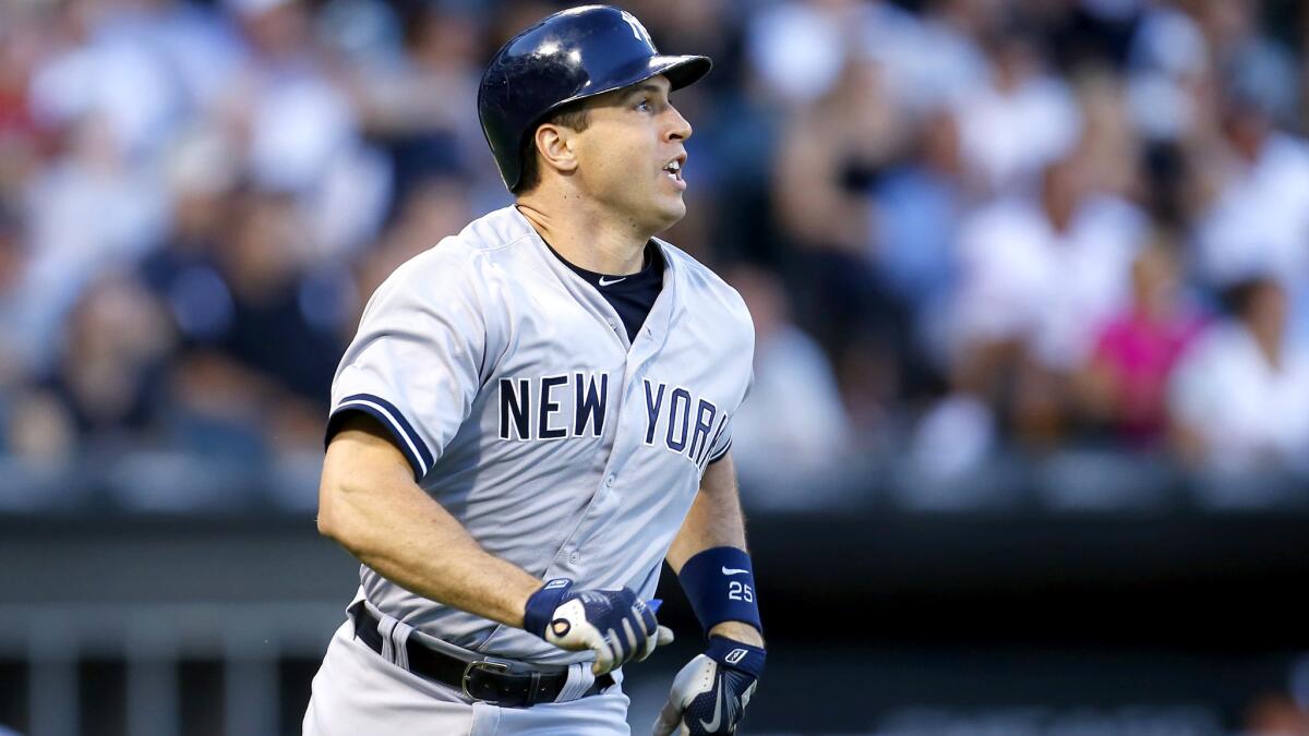 Yankees first baseman Mark Teixeira watches his grand slam during a game against the White Sox earlier this season.