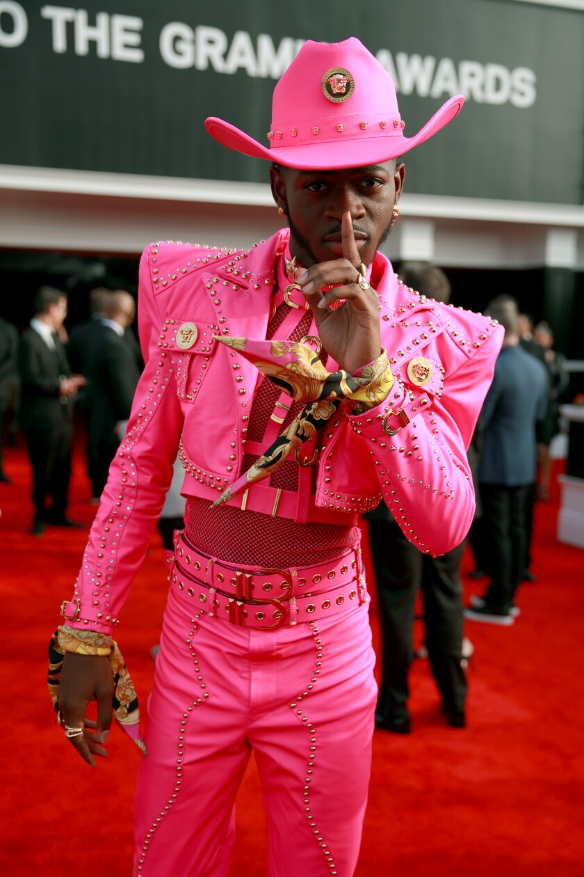 2020 Grammys Lil Nas X Turns Heads In A Hot Pink Versace Outfit On The Red Carpet Los Angeles Times