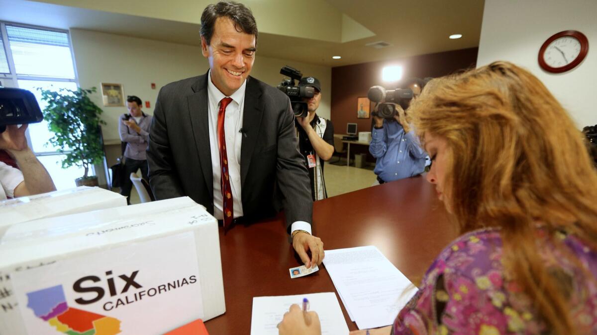 Tim Draper presents petitions in Sacramento for his 2014 initiative to divide California into six states.