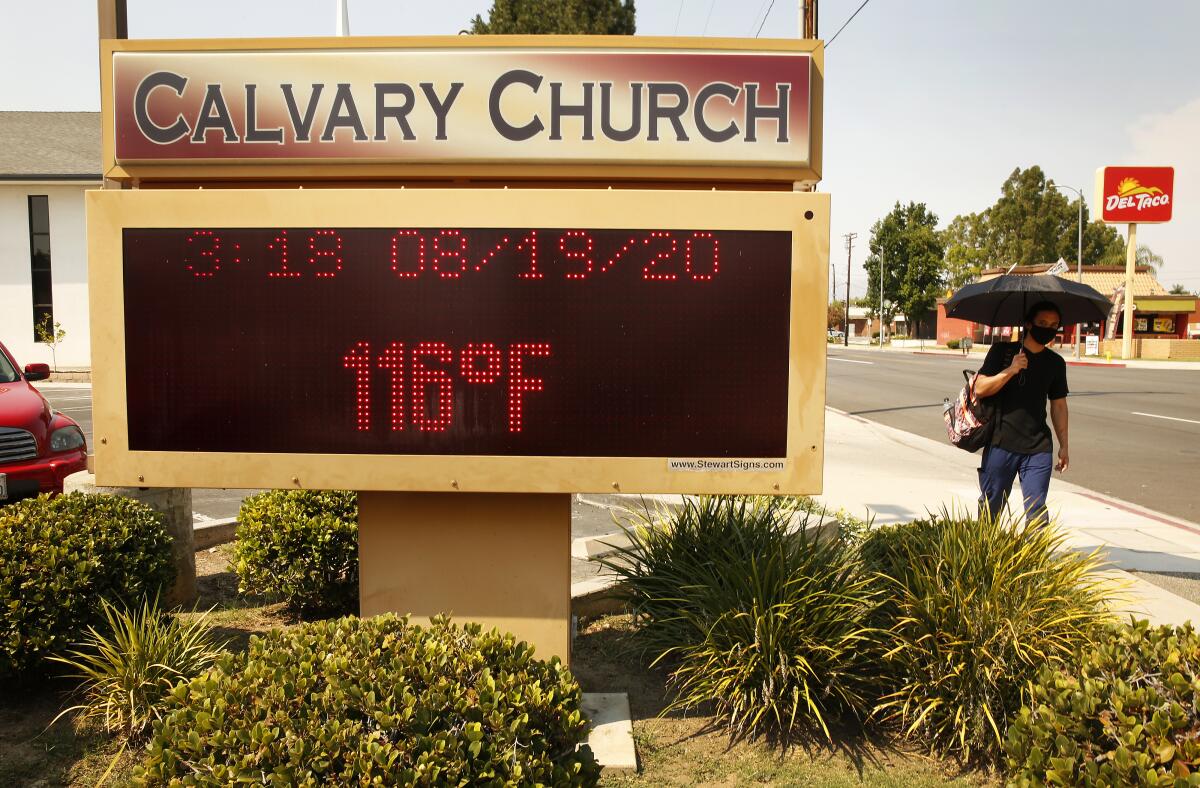 A sign registers 116 degrees Fahrenheit 