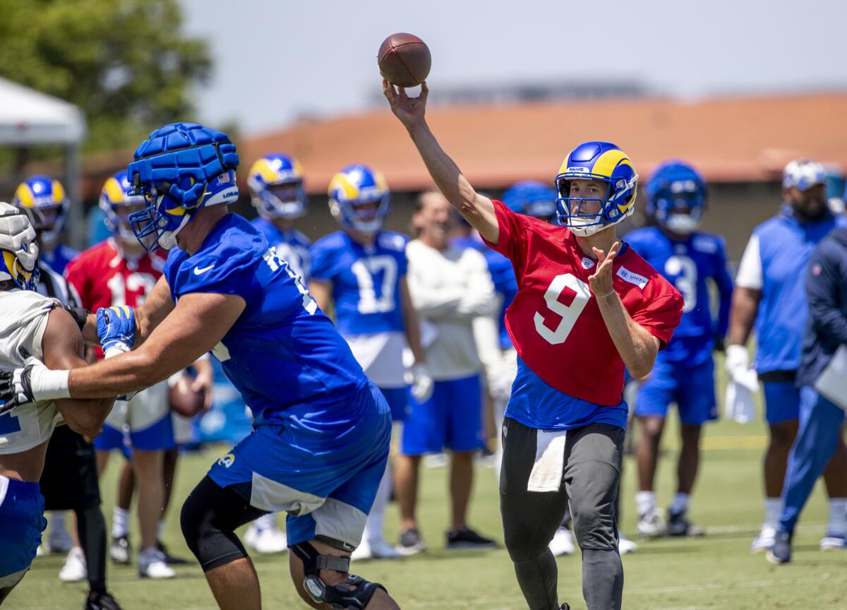 Rams quarterback Matthew Stafford passes during training camp at UC Irvine on Sunday.