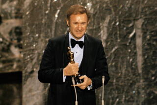 Gene Hackman accepts the Oscar for best actor at the 44th Academy Awards.
