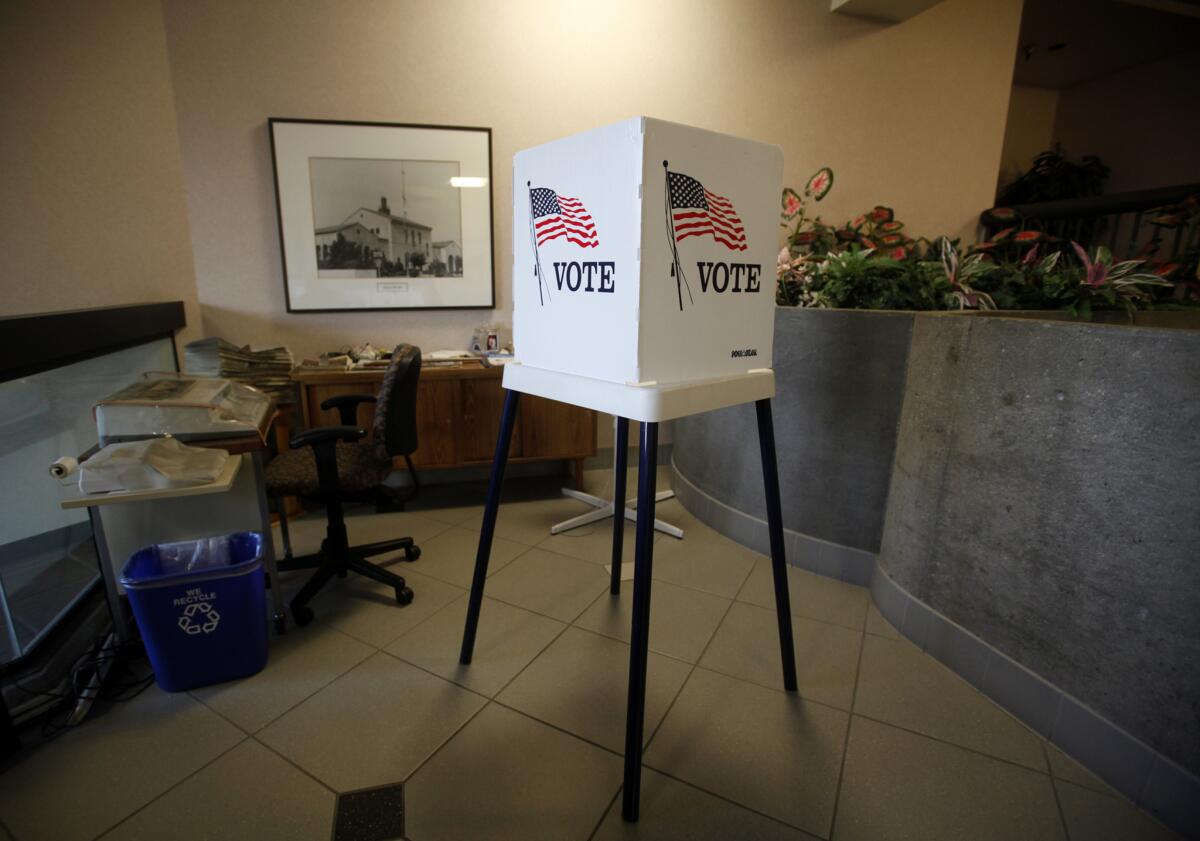 A voting booth at Vernon City Hall in 2012.