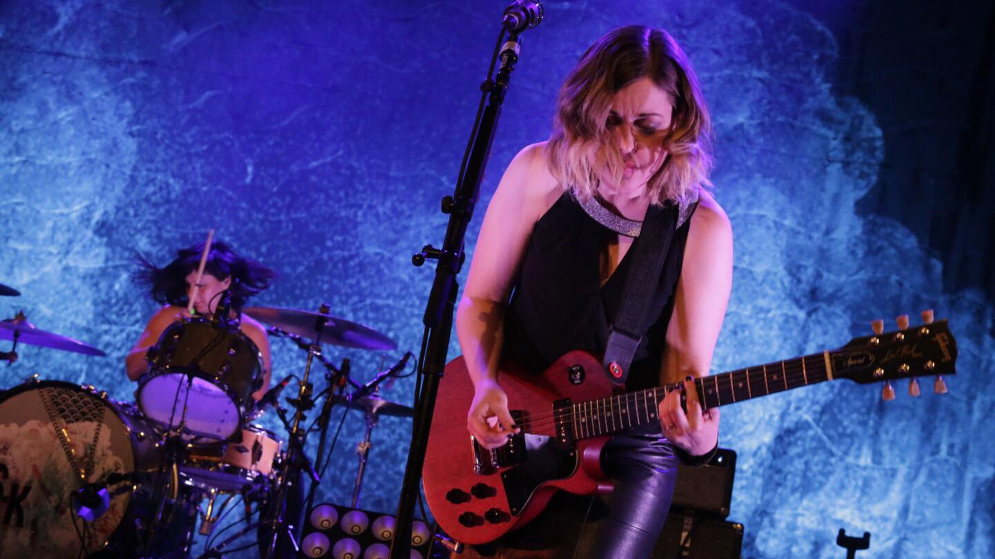 Janet Weiss (left) and Corin Tucker of Sleater-Kinney in concert at the Palladium in Hollywood on Apr. 30, 2015.