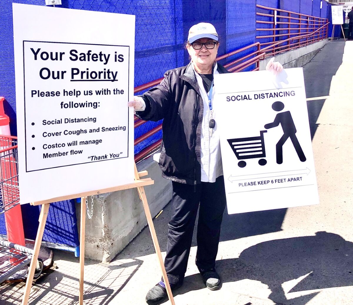 A new look at the entrance to the Costco on Morena Boulevard this week as its employees enforce social distancing directives to customers.