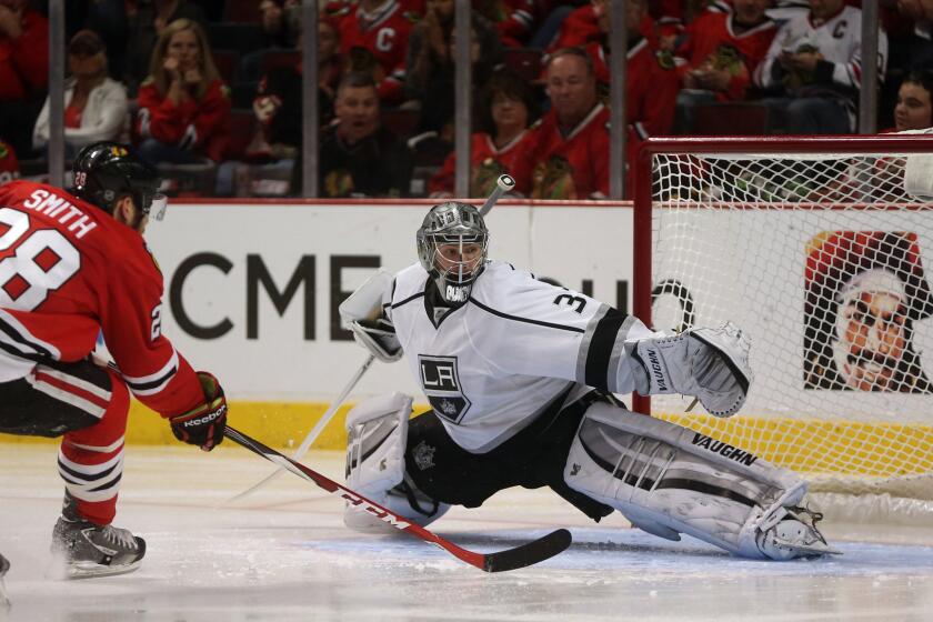 Chicago Blackhawks forward Ben Smith scores on Jonathan Quick during the third period of the Kings' 5-4 double-overtime loss in Game 5 of the Western Conference finals Wednesday.