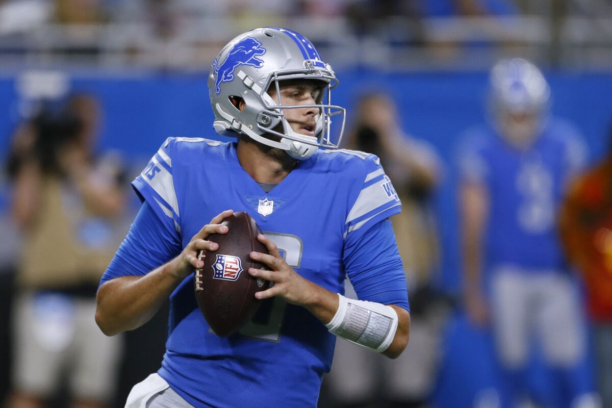 FILE - In this Aug. 13, 2021, file photo, Detroit Lions quarterback Jared Goff drops back to pass during the first half of the team's preseason NFL football game against the Buffalo Bills in Detroit. The Lions made a lot of changes in the offseason by bringing in a new general manager, coach and quarterback. General manager Brad Holmes and coach Dan Campbell might be able to eventually turn the team around, but it's difficult to envision that happening this season with quarterback Goff and a defense that might not be better than last year's historically bad unit. (AP Photo/Duane Burleson, File)