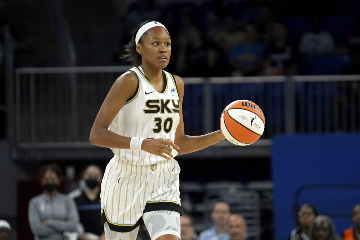 FILE - Chicago Sky's Azura Stevens dribbles the ball during a WNBA basketball game against the Seattle Storm on July 20, 2022, in Chicago. Stevens is heading west, signing with the Los Angeles Sparks the team announced Friday, Feb. 3, 2023. (AP Photo/Charles Rex Arbogast, File)