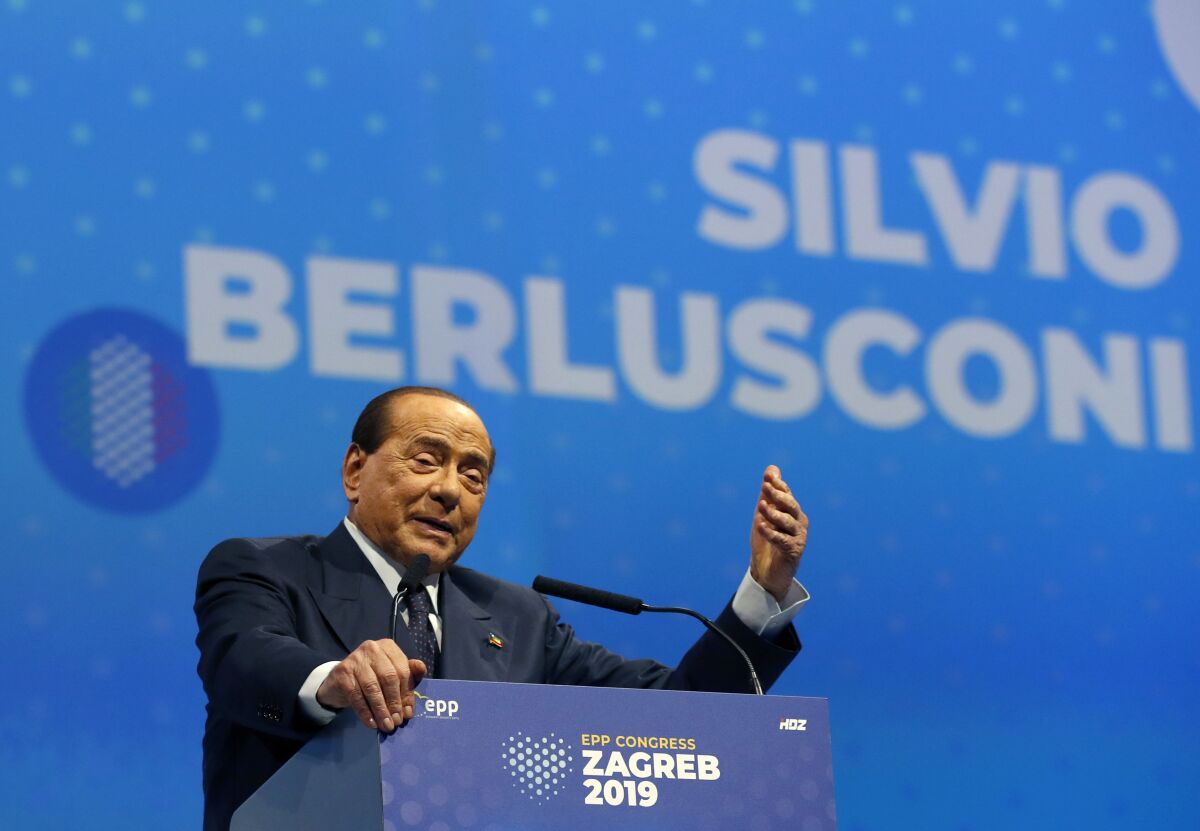 FILE - In this Nov. 21, 2019 file photo, Silvio Berlusconi, Italian former Premier and President of Forza Italia (Go Italy) party speaks during the European Peoples Party (EPP) congress in Zagreb, Croatia. Sen. Lucia Ronzulli, who is a top aide to Silvio Berlusconi told RAI state TV Friday, Sept. 4, 2020, that the former premier was admitted to a Milan hospital early Friday as a precaution to monitor his coronavirus infection after testing positive for COVID-19 earlier in the week. (AP Photo/Darko Vojinovic, file)