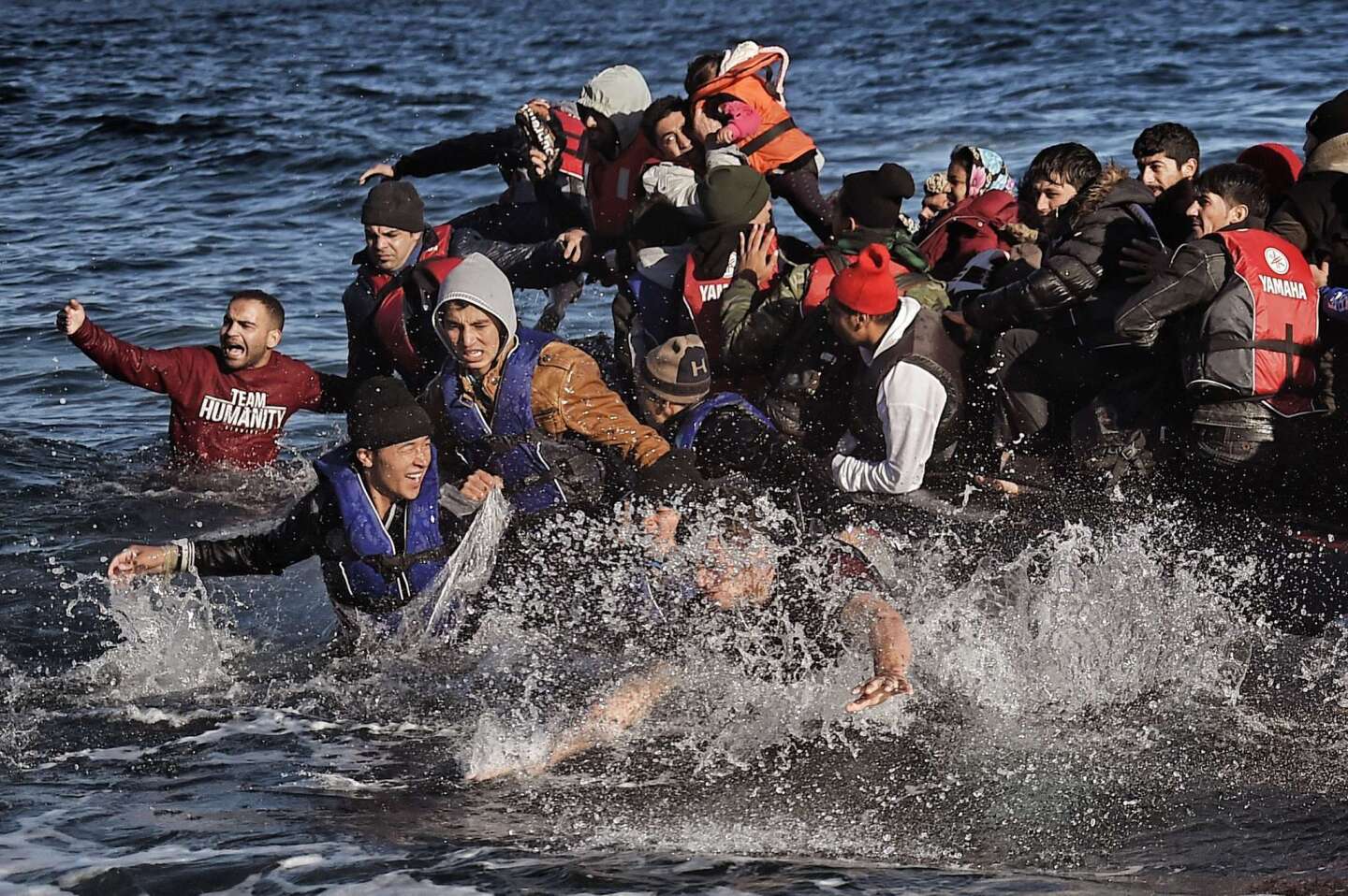Migrants arrive on the Greek island of Lesbos after crossing the Aegean Sea from Turkey. More than 218,000 migrants and refugees crossed the Mediterranean to Europe in October -- a monthly record and more than during the whole of 2014.