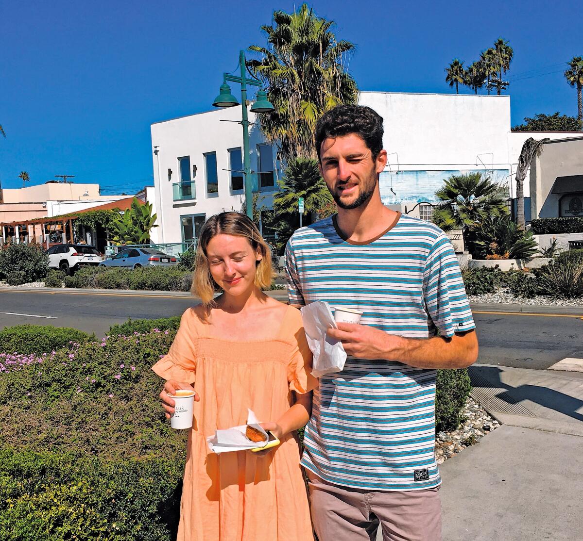 After crossing La Jolla Boulevard near a roundabout, Trevor Port and Makenzie Lowe report: 'It feels safer with cars going slower and drivers more aware.'