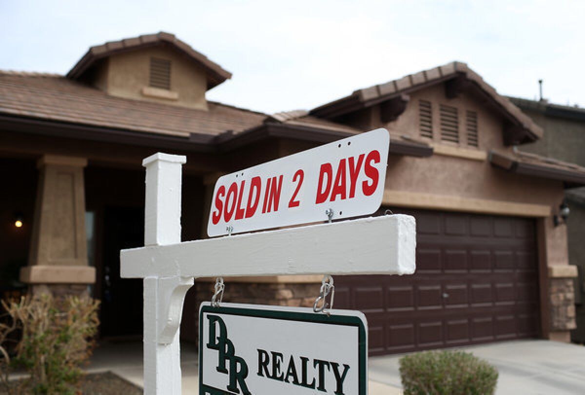 Rising home prices are helping homeowners escape "negative equity" positions. Above, a home for sale this month in Phoenix.