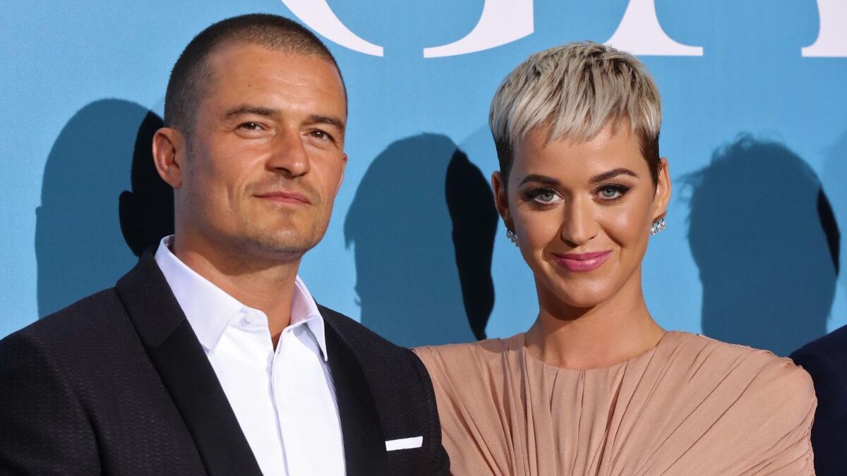 Actor Orlando Bloom and singer Katy Perry set off engagement rumors with their Valentine's Day Instagram posts.