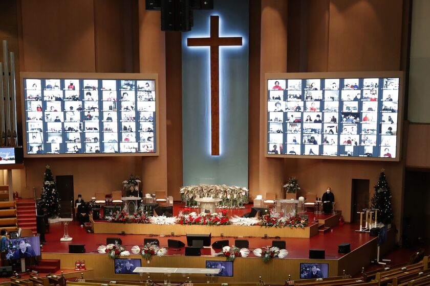 An online Christmas service is held at the Yoido Full Gospel Church in Seoul on Friday.