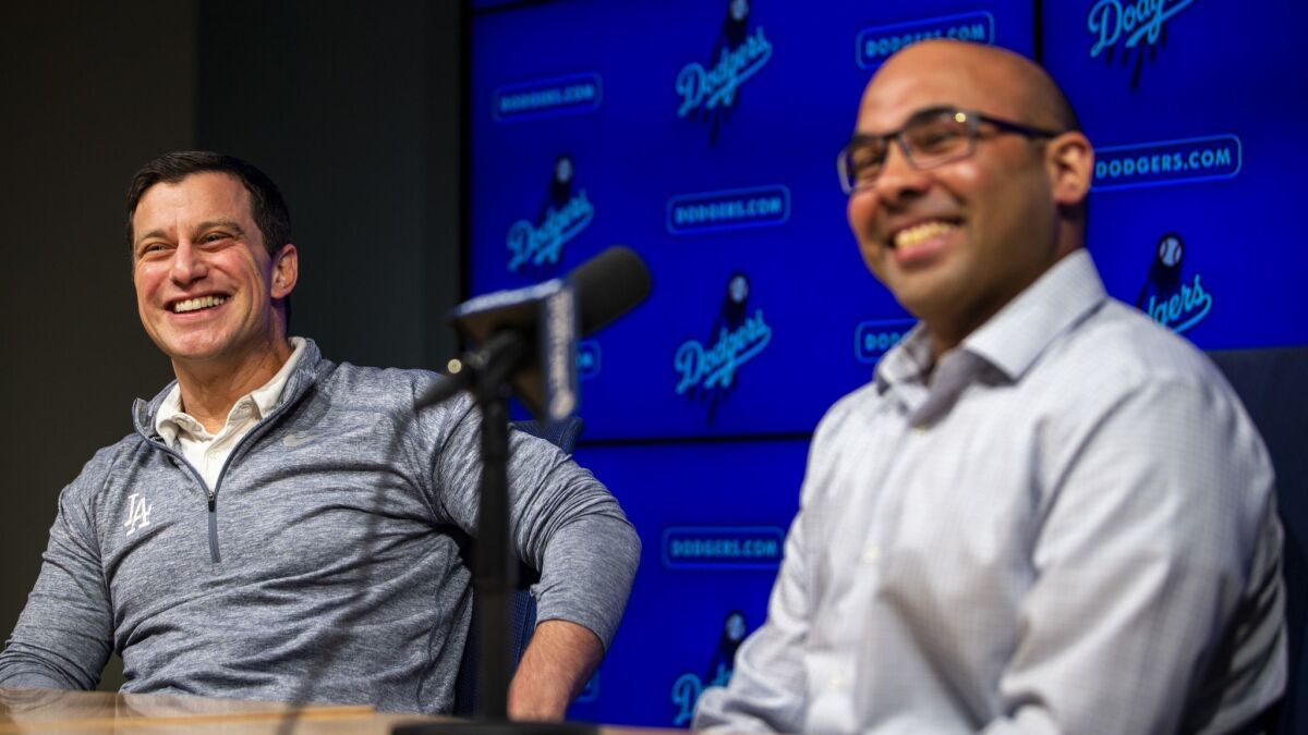 Andrew Friedman and Farhan Zaidi speak at a press conference Nov. 1, 2018, at Dodger Stadium.