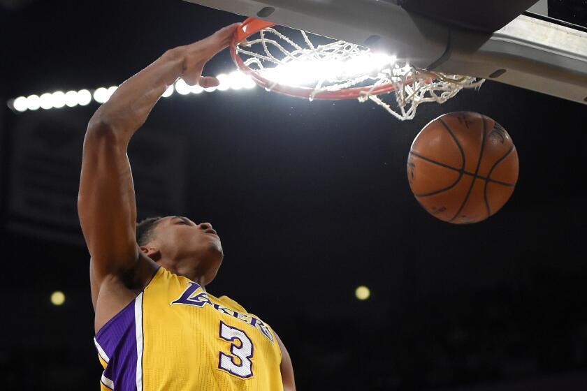 Lakers forward Anthony Brown dunks the ball during the first half of a game against the Bulls on Jan. 28.