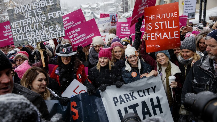 Chelsea Handler joins in with other protesters at the start of the women's march during the Sundance Film Festival in Park City, Utah, on Saturday.