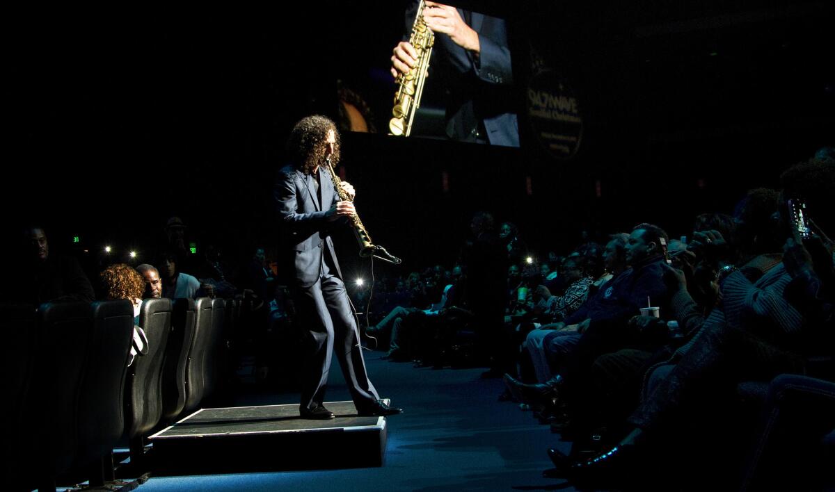 Kenny G performs during 94.7 the Wave's Soulful Christmas concert Friday night at the Nokia Theatre.