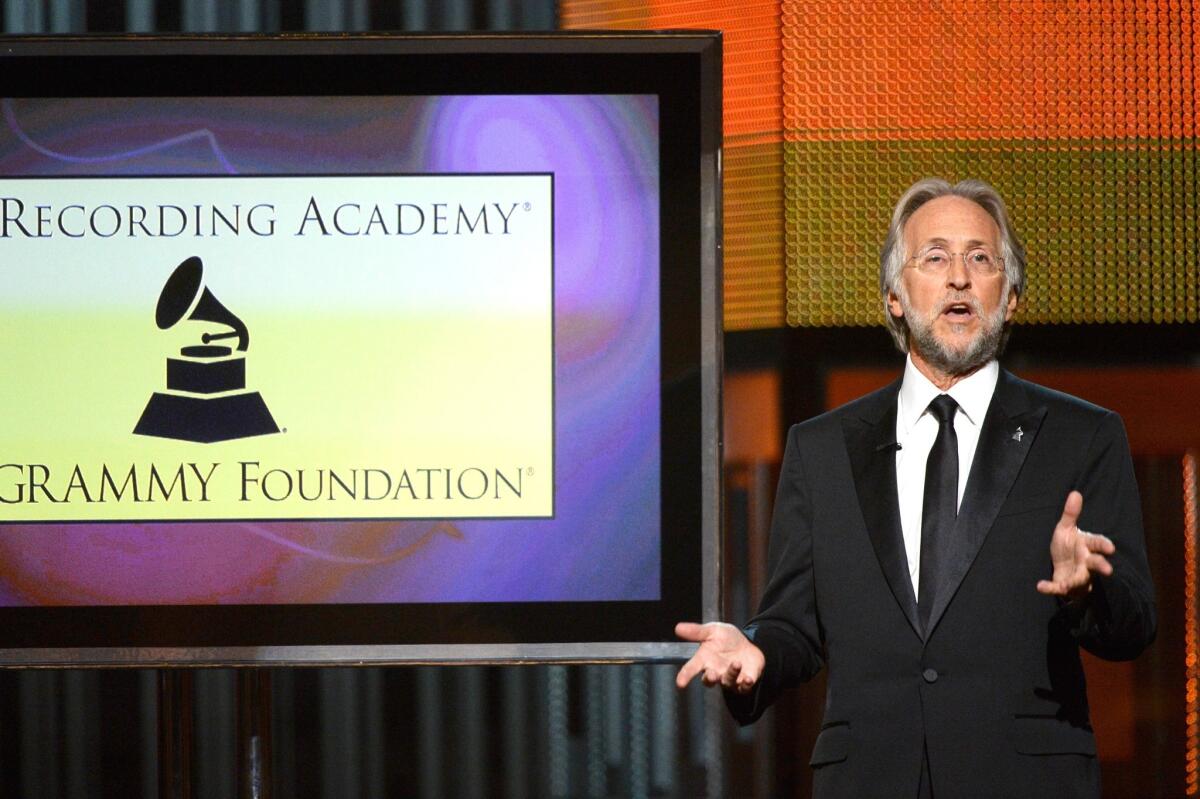 Recording Academy President Neil Portnow speaks onstage during the 56th Grammy Awards at Staples Center.