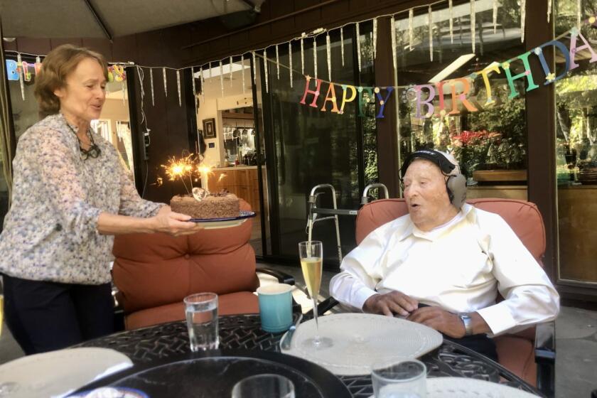 Morrie Markoff at his 108th birthday celebration with his daughter-in-law, Jadwiga.