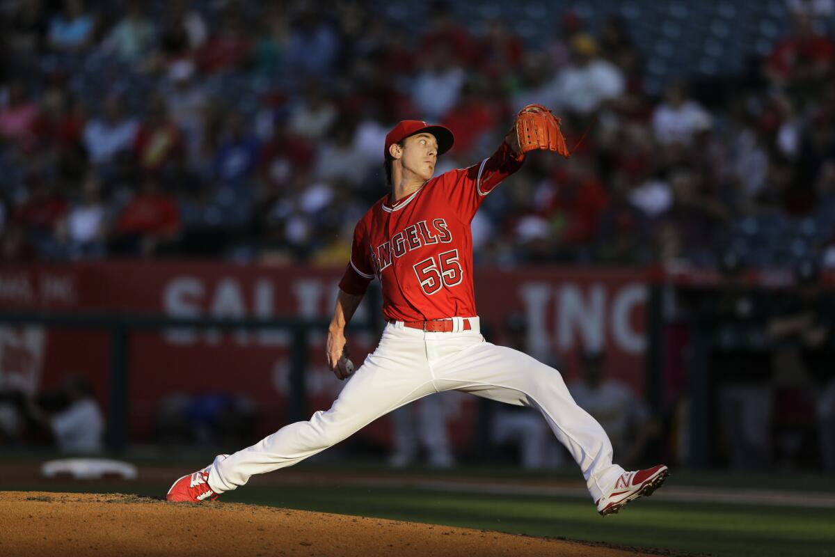 Angels starting pitcher Tim Lincecum works against the Athletics during the first inning.