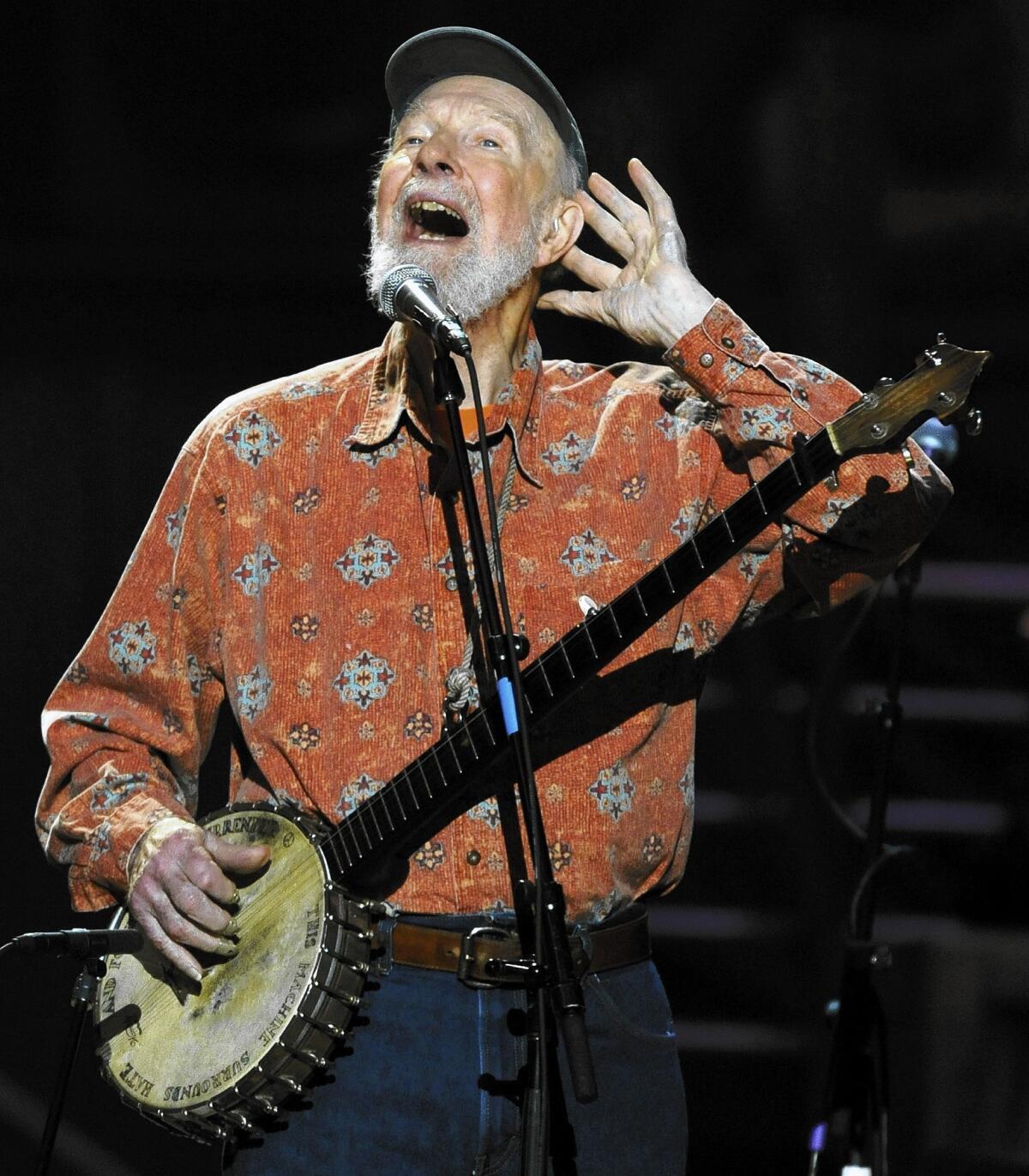 Folk music legend Pete Seeger performs during a concert marking his 90th birthday at Madison Square Garden in New York in 2009. Seeger died this week died at the age of 94.