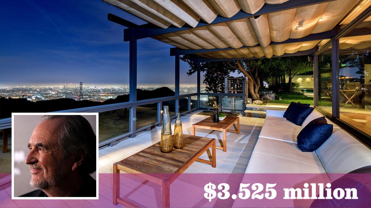 A Hollywood Hills compound owned by late filmmaker Wes Craven and, before him, actor Steve McQueen, has sold for above the asking price.