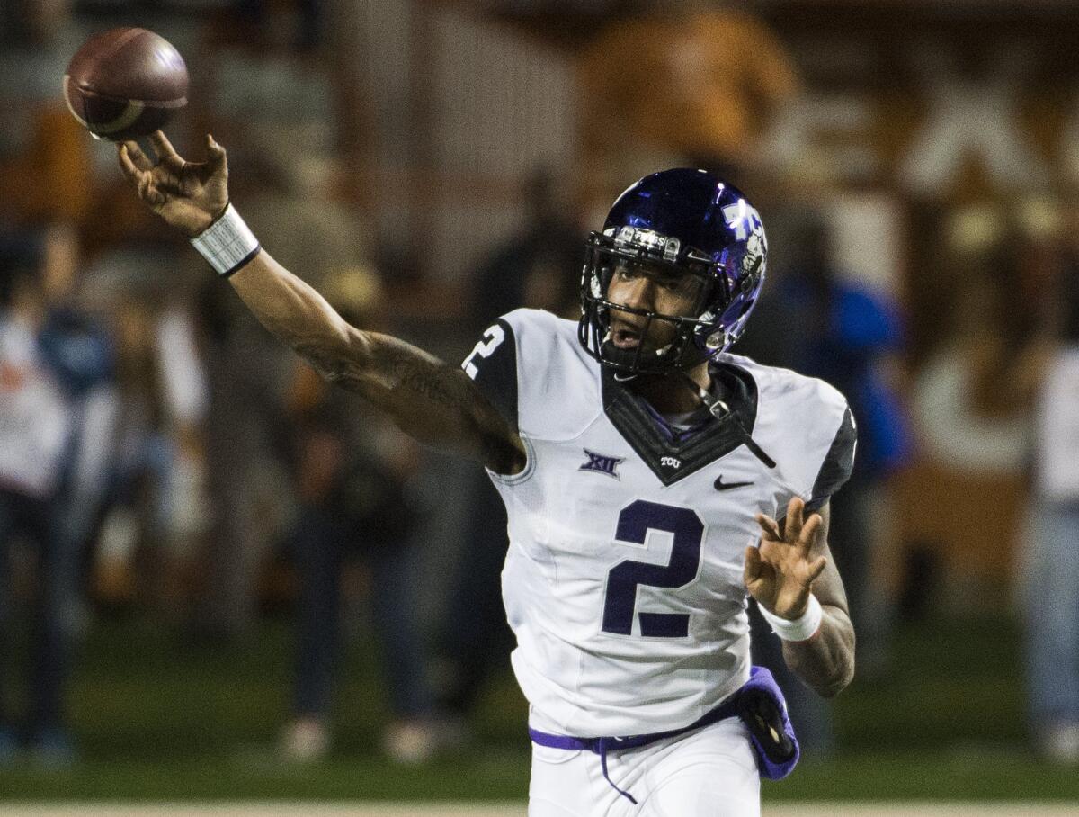 Texas Christian quarterback Trevone Boykin completed 20 of 34 passes for 233 yards and two touchdowns in a win over Texas, 48-10. He also rushed for a touchdown of his own.