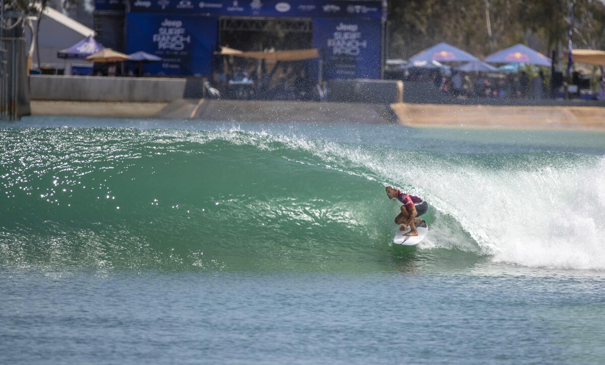 Kelly Slater gets a long tube ride during the Jeep Surf Ranch Pro on June 20.