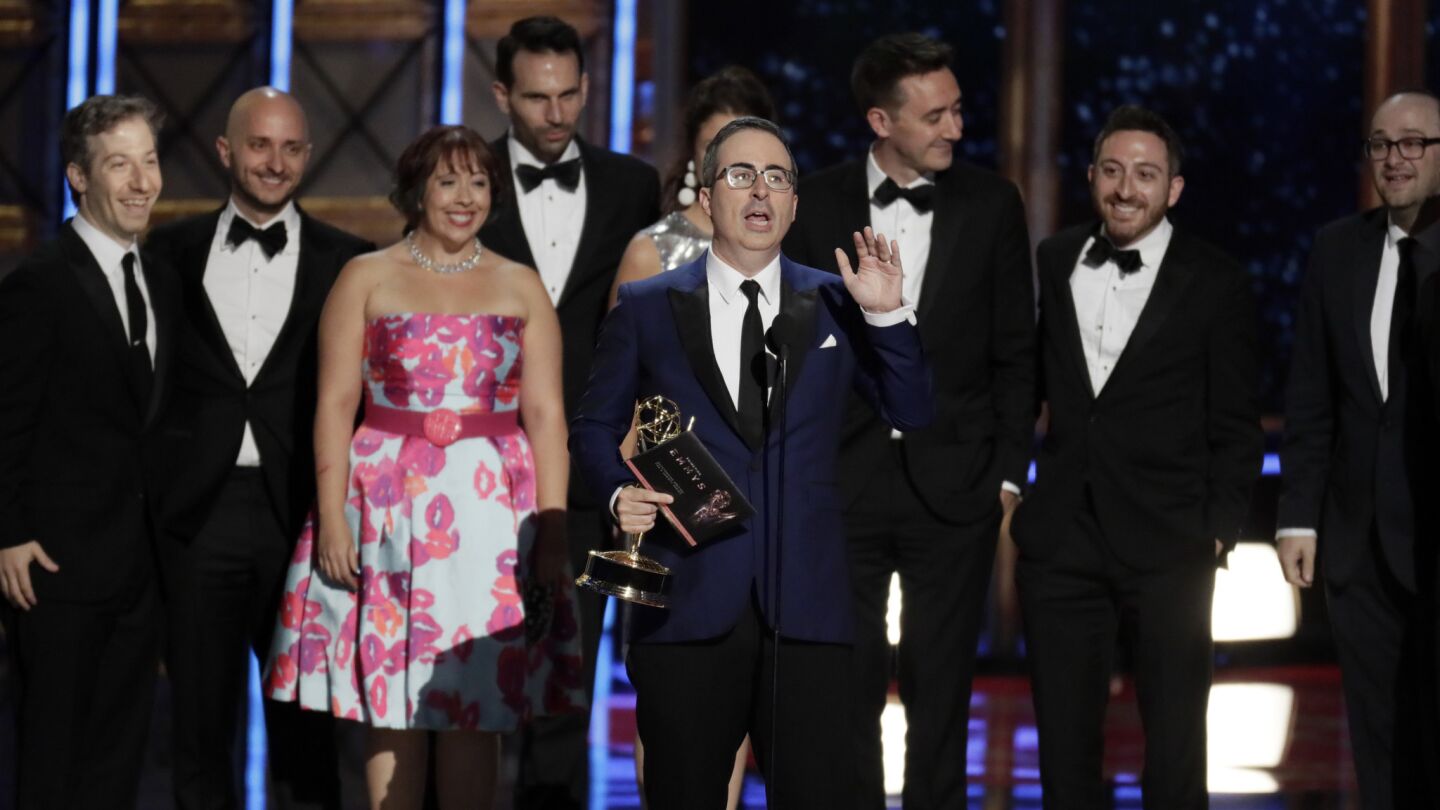 John Oliver of "Last Week Tonight with John Oliver" accept the award for variety talk series.