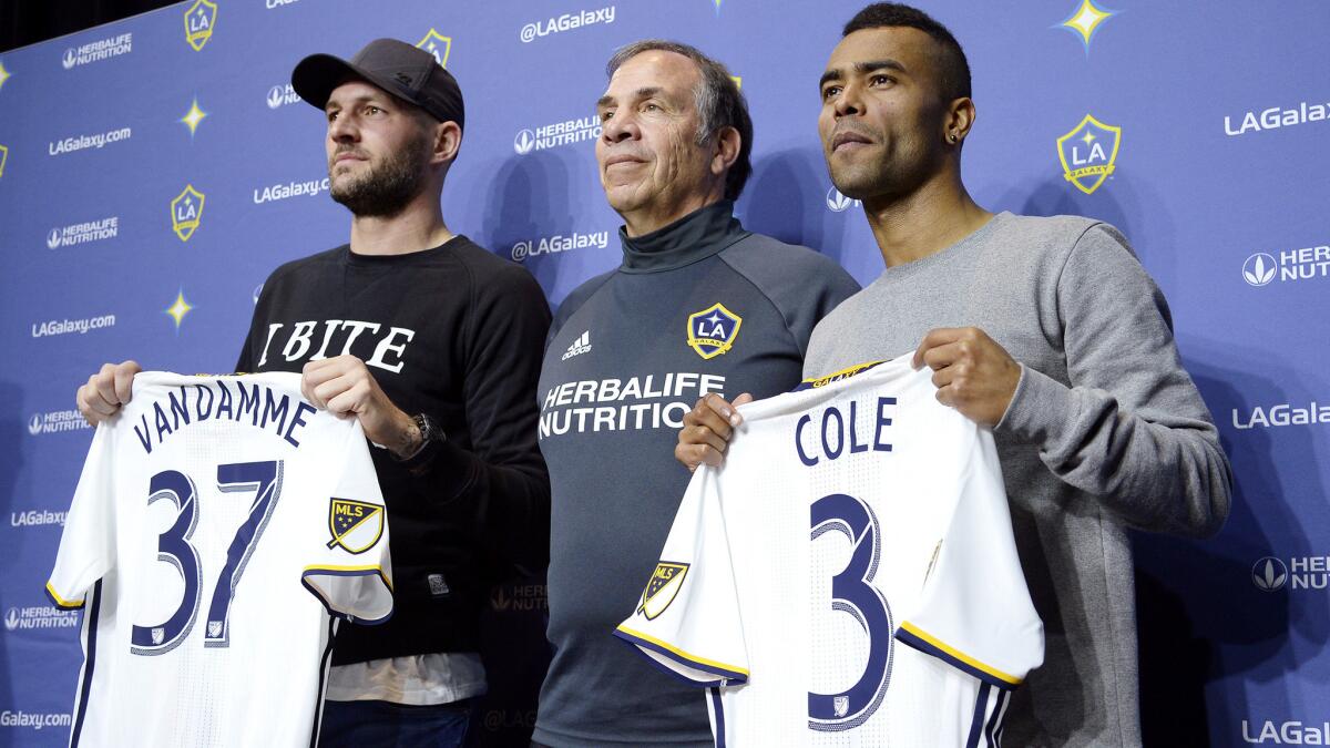 Galaxy GM Bruce Arena, center, brought in plenty of new talent in Jelle Van Damme and Ashley Cole, now as coach he must make it mesh.
