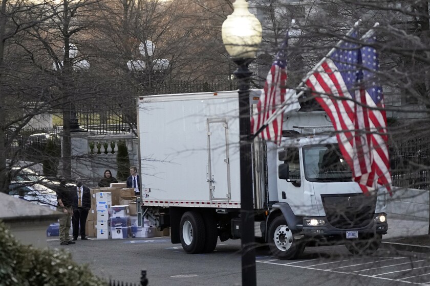 A van arrives inside the White House complex.