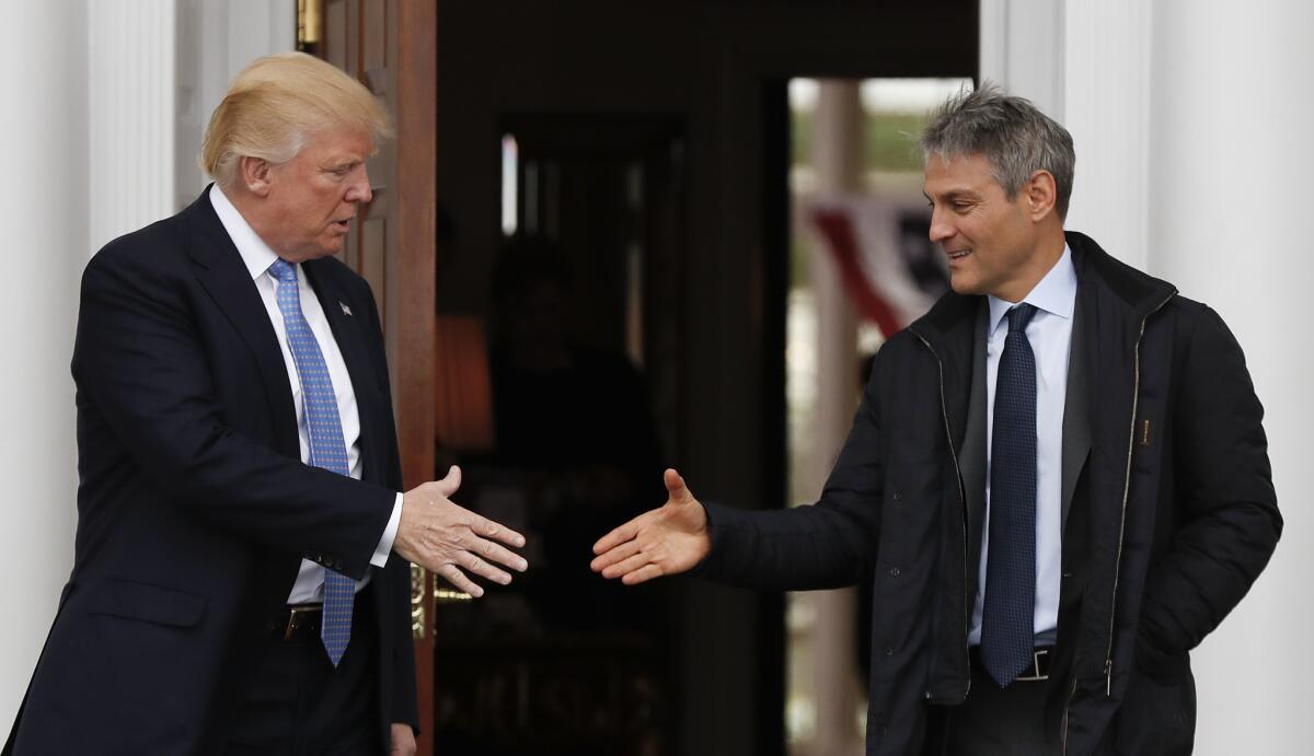 President-elect Donald Trump, left, shakes hands with Ari Emanuel as he leaves the Trump National Golf Club Bedminster clubhouse on Nov. 20, 2016, in Bedminster, N.J.