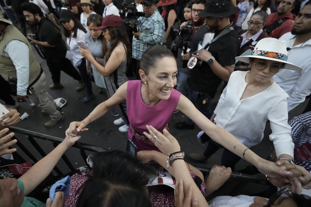 Mexico City Mayor Claudia Sheinbaum greeting supporters