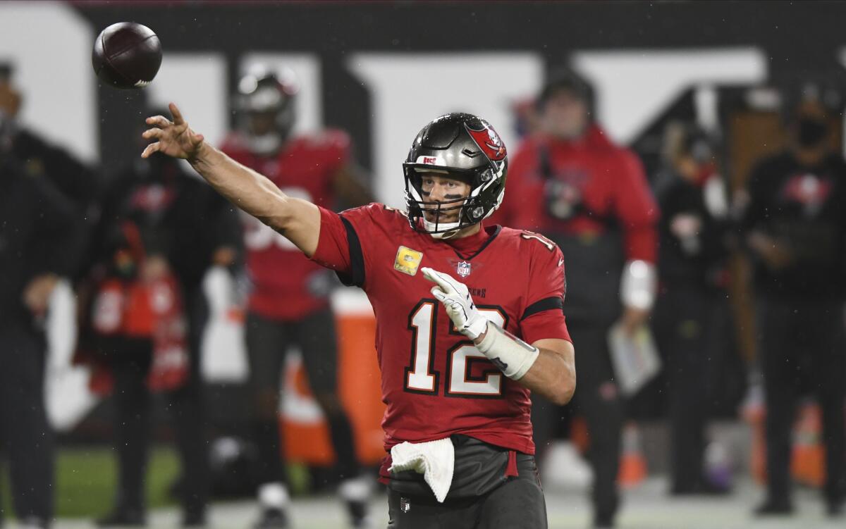 Tampa Bay Buccaneers quarterback Tom Brady throws a pass against the New Orleans Saints.