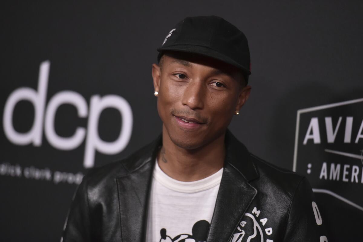 Pharrell Williams arrives at the 23rd annual Hollywood Film Awards in Beverly Hills, Calif.  in 2019.