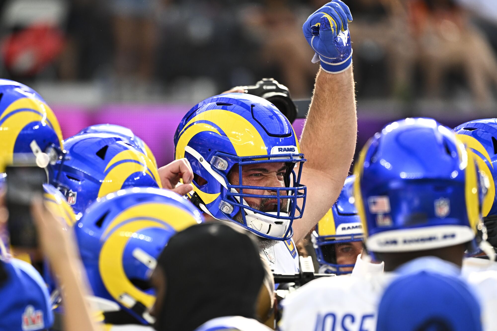 Rams offensive tackle Andrew Whitworth raises his fist before the start of the game.