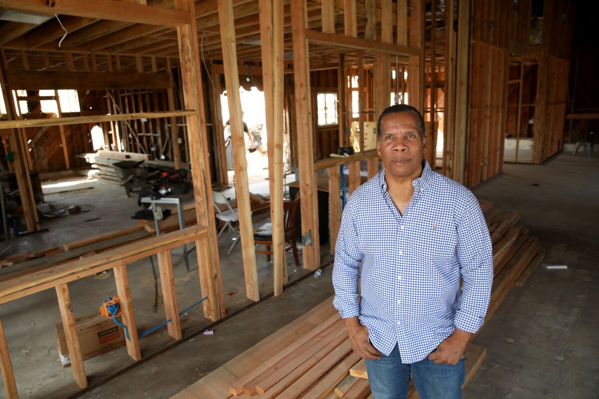 A man inside a building under construction