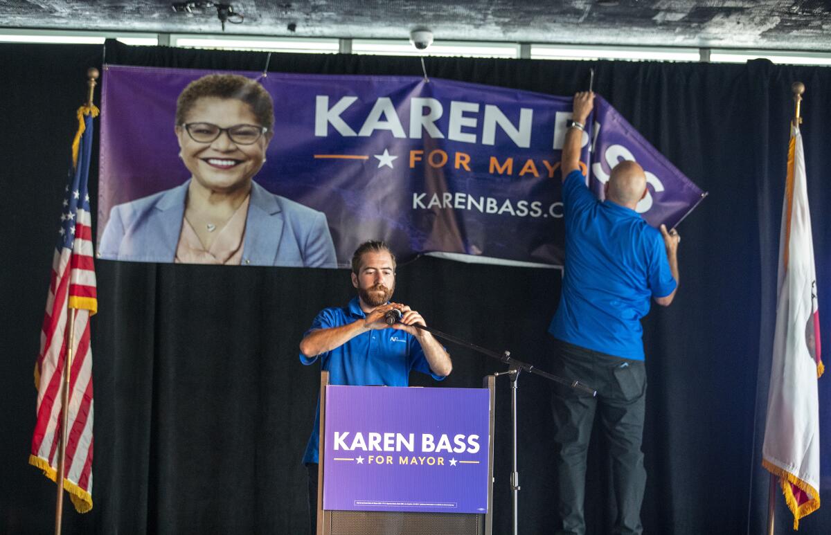 Staff prepare the venue for Karen Bass election night party at the W Hotel in Hollywood.