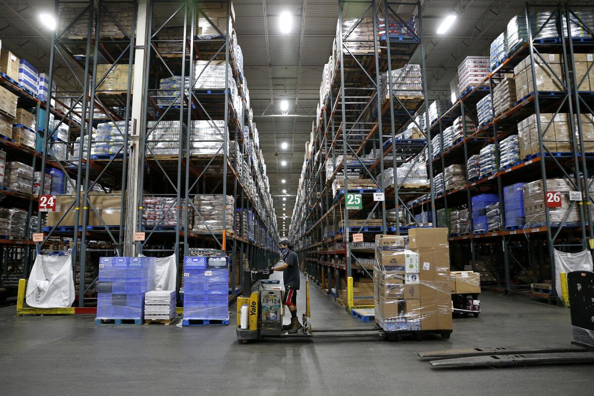 A worker in a warehouse.