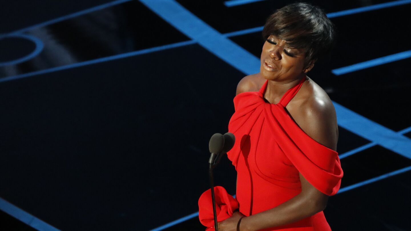 Viola Davis accepts the Oscar for supporting actress during the telecast of the 89th Academy Awards.