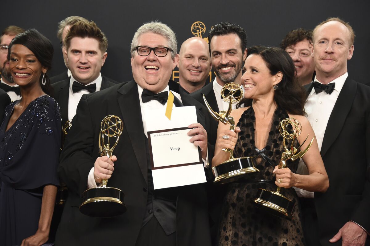 'Veep' showrunner David Mandel, center, stands with the show's cast and crew at the 68th Primetime Emmy Awards.