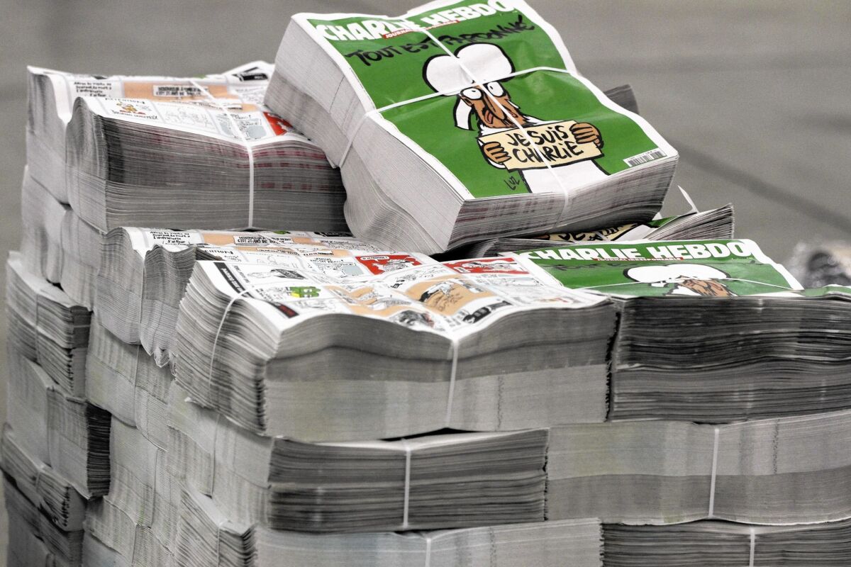 Copies of the upcoming edition of the French satirical magazine Charlie Hebdo are stacked at a distribution centre in Nantes, France, on Jan. 13, 2015.
