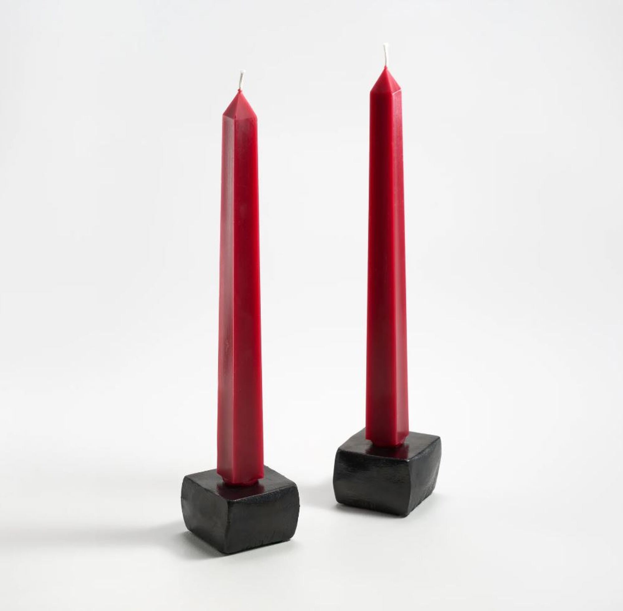 Two red candles sticks 