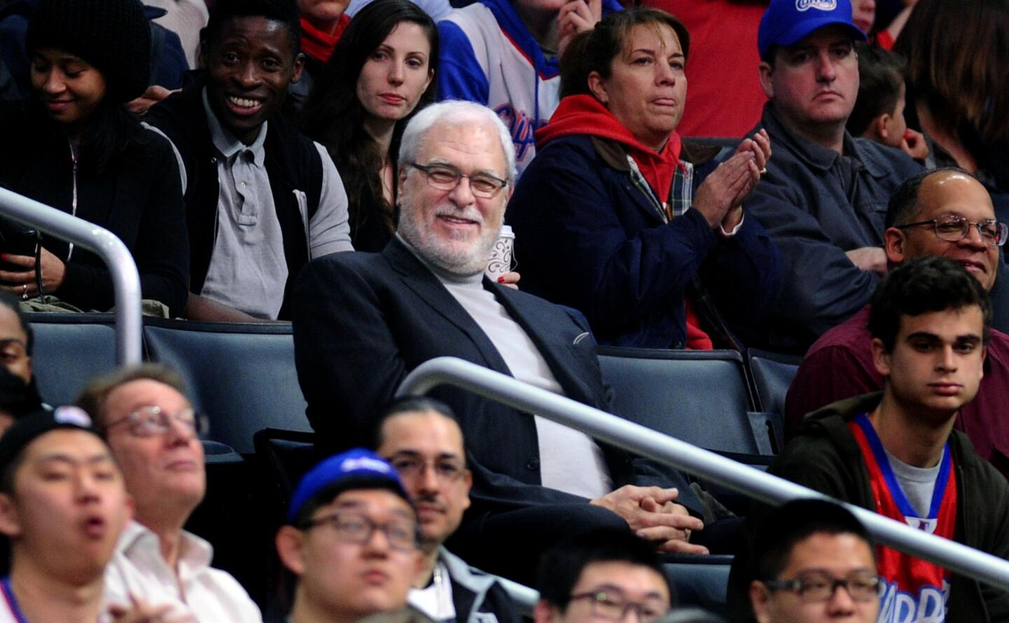 Former Lakers coach and Knicks President Phil Jackson watches the game at Staples Center on Wednesday.